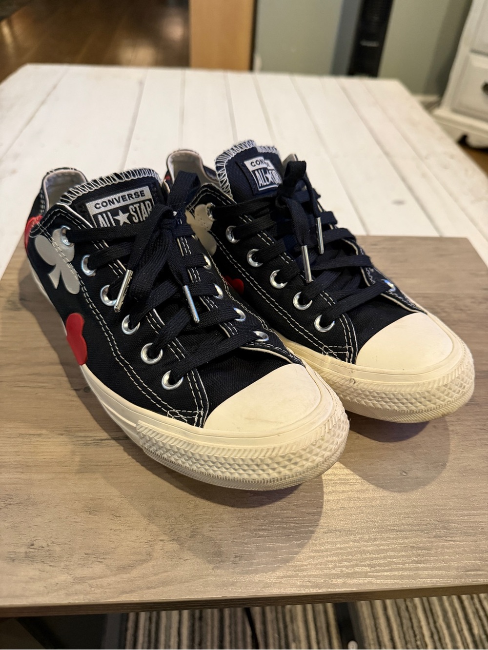 Converse Women’s Black Canvas Sneakers with Red and White Heart Accents